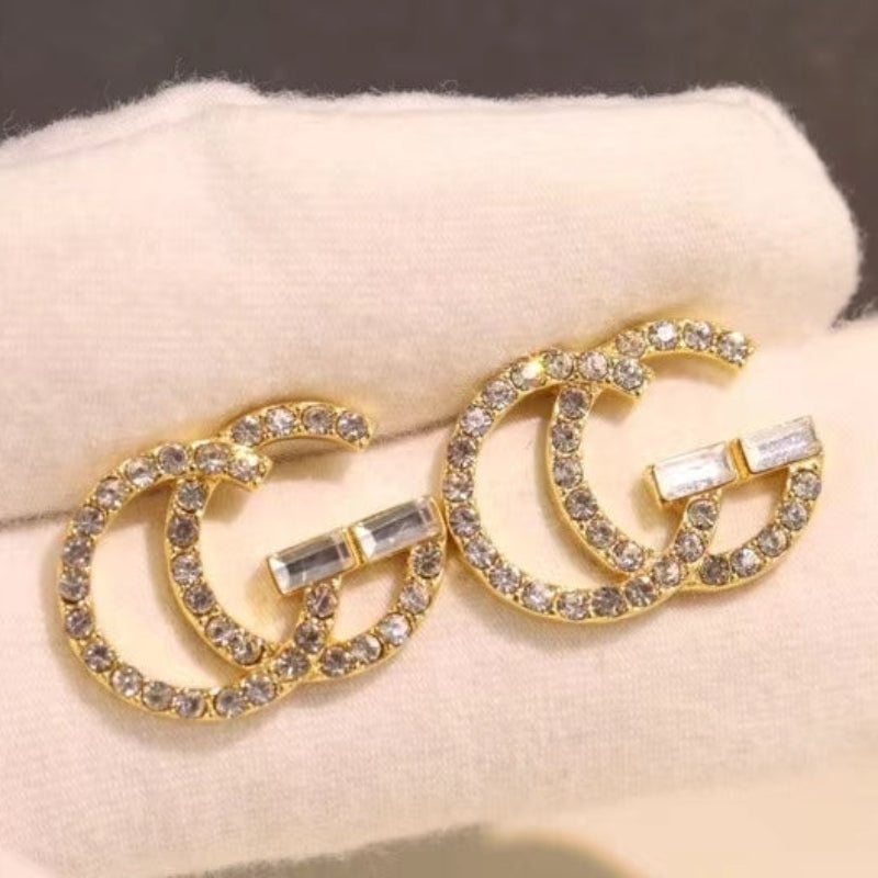 GE104 classic logo earrings with diamonds, simple and versatile
