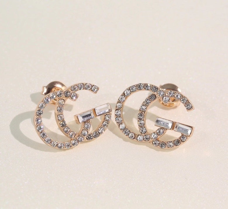 GE104 classic logo earrings with diamonds, simple and versatile