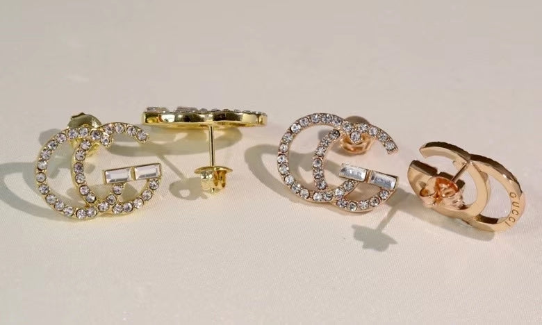 GE104 classic logo earrings with diamonds, simple and versatile