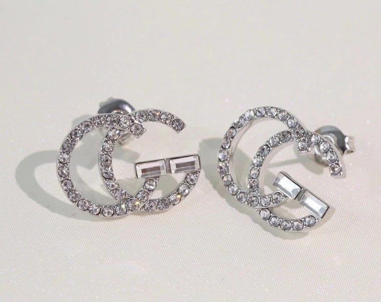 GE104 classic logo earrings with diamonds, simple and versatile